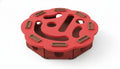 A red octagonal puzzle toy with brown blocks on a white background for problem solving