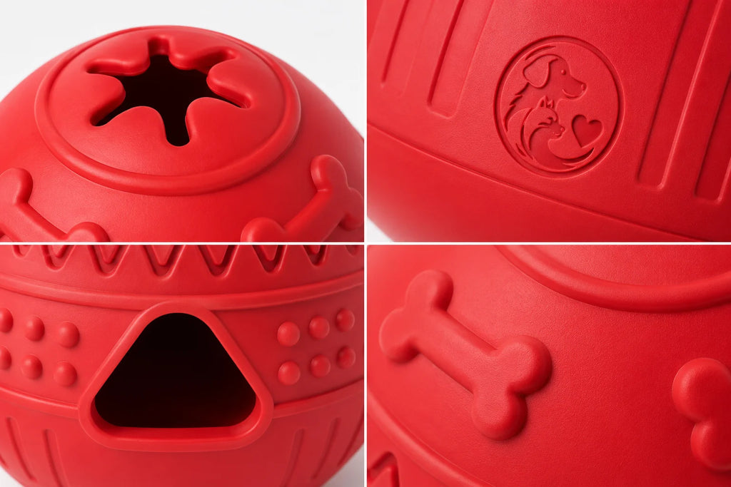 Red rubber dog puzzle toy with bone and dog logo details close-up